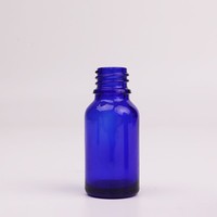 Bouteilles d'huile essentielle en verre à épaulement rond bleu cobalt 10ml 15ml 50ml 100ml avec couvercle pour emballage de récipient cosmétique multi-taille