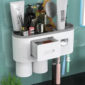 Groothandel Mode Creatieve Abs Plastic Automatische Tandpasta Dispenser 2 Cup Magnetische Muur Gemonteerde Tandenborstel Houder