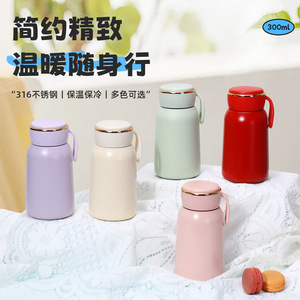 Bouteille d'eau isotherme en acier inoxydable 316 rose, mini-gobelet de voyage portable avec poignée et base en silicone, design rond - Product Image 4