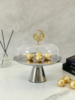 Support à gâteau élégant et écologique en acier inoxydable de luxe avec couvercle en acrylique transparent et bouton sculpté doré pour la présentation de desserts