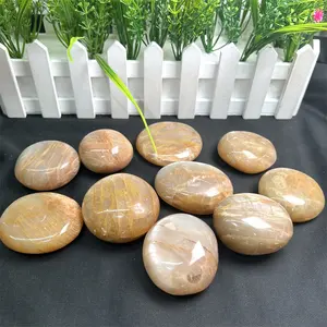 Wholesale Natural Stone Orange Moon Stone Oval Shaped Palm Stone For Decoration