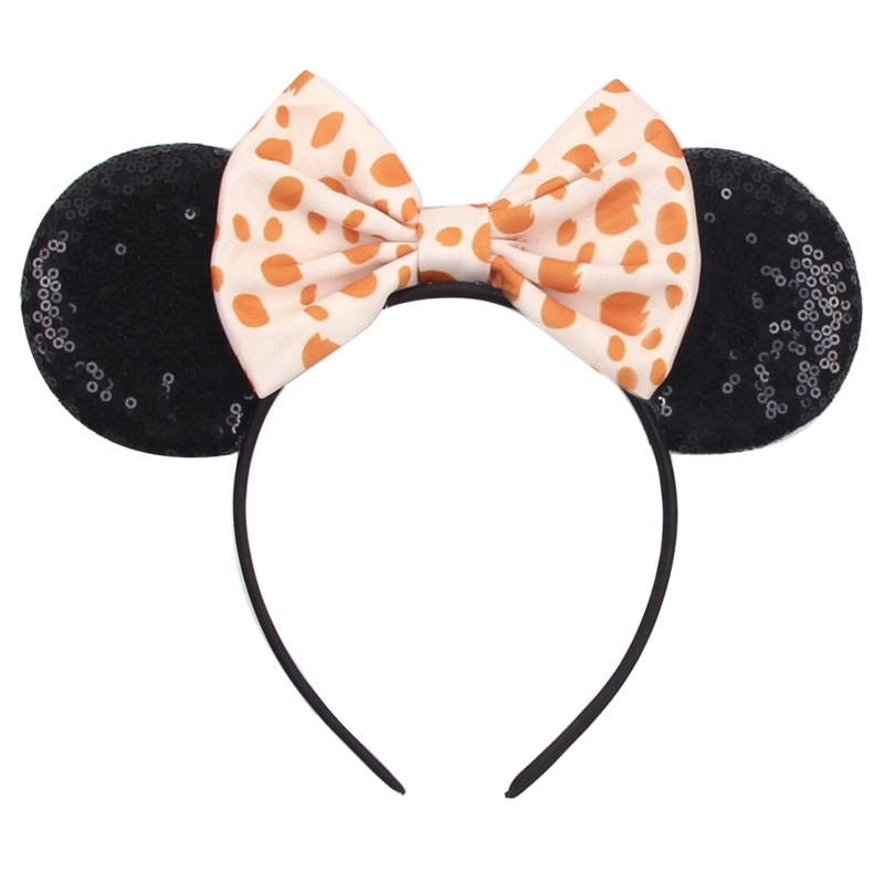 Cerchietto orecchie di topo con fiocco pois