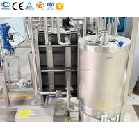 Machine de pasteurisation à plaques HTST 500-20000L avec pompe, contrôle PLC, fonctionnement automatique, haute productivité pour le traitement des jus de fruits