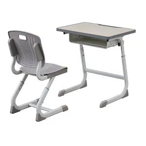 モダンな新しいデザインの学校の教室の家具調節可能な高さの金属製の脚の机と引き出し付きのPPプラスチック製の椅子