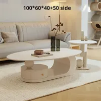 Ensemble de table basse créative en 2 pièces de style crème pour salon, forme ovale, petite unité, style italien, minimaliste, avec rangement