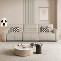 Ensemble de canapés modulaires sectionnels en cuir crème moderne avec fonction de relaxation électrique, prêt à être expédié, pour hôtels, villas et vente en gros de mobilier