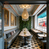 Ensemble de chaises de banquettes en cuir gris foncé de style européen avec structure métallique et table en bois pour café, restaurant, cafétéria, hôtel