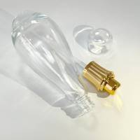 Soins de la peau personnalisés 60ml 120ml 150ml Conception en forme de boule de bowling Emballage cosmétique de luxe Ensembles de bouteilles et de bocaux en verre