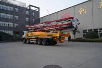 Camion pompe à béton d'occasion HB58K bien entretenu, robuste, avec flèche de placement de 58 mètres, prêt pour l'expédition