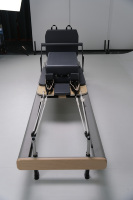 Reformer de Pilates en alliage d'aluminium anatomique avec ressorts allemands, vente en gros pour studios et salles de sport commerciales, pour renforcer les muscles profonds
