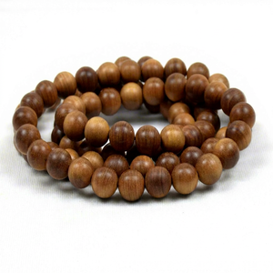 Collier hindou aromatique original Riddhi Siddhi avec sculpture en bois de santal et perles Guru naturelles brun doré foncé du Rajasthan - Product Image 1