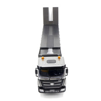Huina 1318 Nouveau Camion Benne RC en Métal Gris-Blanc à Neuf Canaux 1:18 Électrique Multifonction Portée de Contrôle à Distance de 25m Prêt à l'Emploi