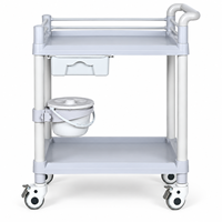 Chariot médical ABS à deux niveaux pour salle d'opération avec un seul tiroir et des barrières de sécurité pour la manipulation des instruments et le soutien clinique