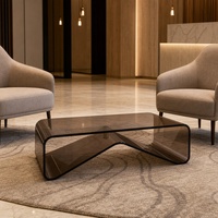 Table basse moderne minimaliste en acrylique noir avec base géométrique durable pour un mobilier élégant de bureau à domicile et de salon