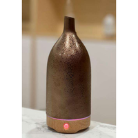 Diffuseur de brume ultrasonique avec glaçure réactive