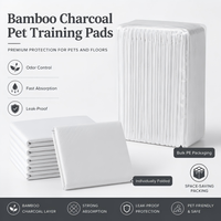 Vente en gros usine de tapis d'apprentissage jetables pour chiens en charbon de bambou et PE, anti-odeur, écologiques, imperméables et anti-fuites, pour l'entraînement des chiots
