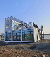 Maison conteneur pliable personnalisée de 20 pieds, maison modulaire préfabriquée avec terrasse, dortoir et bureau pour chantier de construction