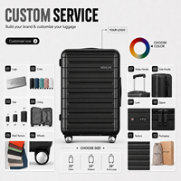 Valise à roulettes de luxe personnalisable en PC noir mat gaufré pour distributeurs de marques de prestige, commande en gros