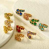 Bague tendance pour femme en acier inoxydable plaqué or, incrustée de zircon vert émeraude multiforme en forme de goutte d'eau