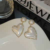 Boucles d'oreilles pendantes exagérées pour femmes, polyvalentes, haut de gamme, accessoires d'oreille élégants