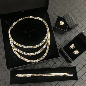 Classic Great Wall Pattern Four Pieces Set Gold And Silver Double Color Mix And Match Hollow Pattern Metal Set