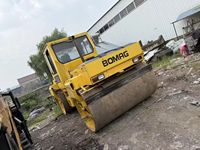 Rouleau compresseur vibrant à double tambour d'occasion Bomag BW202AHD-2, moteur diesel Honda, force de compression 28KN, modèle 2004, en excellent état