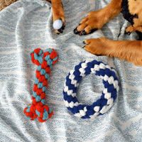 Vente en gros de fournitures pour animaux de compagnie Jouets à mâcher en coton pour chiens, chiots, anneaux en os tressés durables, jouets sûrs et agréables pour chiens