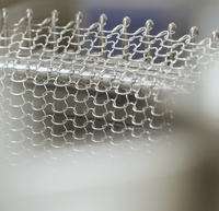 Machine tricotage circulaire tissée, avec outil de tissage circulaire