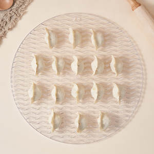 Bandeja redonda de plástico para dumplings, tapete para vaporera de uso doméstico con diseño de ondas, superficie antiadherente, fácil de limpiar - Product Image 1