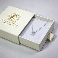 Boîte à bijoux coulissante de luxe en papier avec logo personnalisé, dorure à chaud, faible MOQ, emballage cadeau compact avec ruban pour bagues et colliers