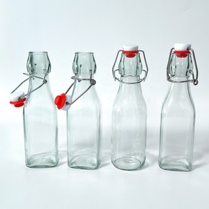 Envase de Vidrio Reutilizable con Tapa Abatible y Tapón de Goma Hermético para Almacenamiento de Té Frío, Aceite de Oliva, Vinagre y Condimentos de Cocina - Product Image 5