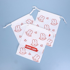 ผ้าเช็ดตัวพิมพ์ลายจากโรงงาน ชุดเสื้อผ้าเด็กแขนสั้นพร้อมครีมกันแดด บรรจุในถุงแบบม้วน - Product Image 2