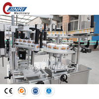 Prix usine étiqueteuse ronde en plastique verre bouteille de vin adhésif autocollant poignée étiquetage Machine d'emballage