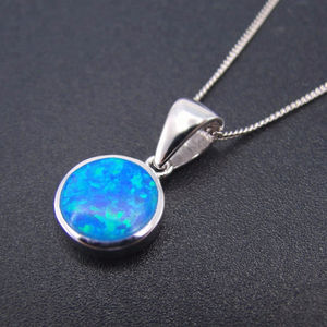 Ensemble de bijoux en argent sterling 925 pour femmes, pendentif rond en opale de feu bleue plaqué rhodium, vente en gros, pour cadeau - Product Image 1
