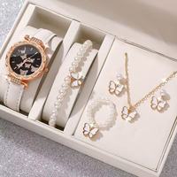 Montre de luxe à quartz, boîtier rond, cadran en verre, bracelet en simili cuir, jour/date, résistance à l'eau 10 bars