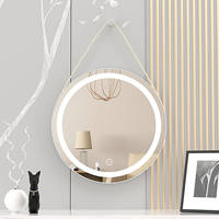 Miroir de Maquillage LED Intelligent à Cadre Métallique Rond, Style Moderne et Luxueux, avec Commande Tactile, Éclairage et Fonctionnalités Personnalisées pour Hôtels