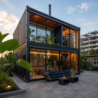 Maison conteneur modulaire préfabriquée empilable de 20 pieds à deux étages avec panneaux sandwich pour usage en entrepôt portuaire ou bureau