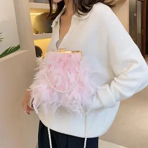 नई फैशन शुतुरमुर्ग पंख चंगुल देवियों मोती हाथ डिजाइनर बैग भोज ढोना बैग महिलाओं के हाथ बैग