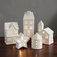 Figurine de maison de Noël en céramique avec lumière, décor de table de Noël sculpté creux, cadeau de décoration pour la maison, vente en gros