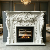 Cheminée en marbre blanc de style rococo français, sculptée à la main avec des motifs de roses, pour la décoration de villas et de maisons.