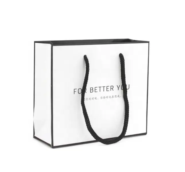 Bolsa de papel de lujo con nombre de empresa personalizada para boutique, embalaje blanco para joyería, logotipo impreso, bolsa de regalo