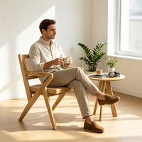 Fauteuil nordique en bois massif et rotin, dossier et assise en cannage tressé à la main, design à pieds croisés pour salle à manger, salon, hôtel et café