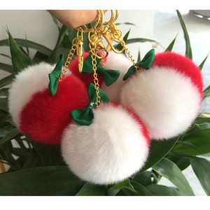 Porte-clés en fausse fourrure, pompons colorés avec nœud, accessoire pour sac ou voiture pour filles - Product Image 1
