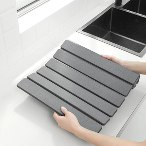 แผ่นรองจานแบบพับได้ แห้งเร็ว ทำจากดินเบา สำหรับวางบนเคาน์เตอร์ครัว - Product Image 2