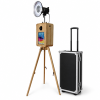 Coque de photomaton portable rétro en bois pour iPad avec compatibilité appareil photo et reflex numérique, impression instantanée, et flight case pour mariages et événements