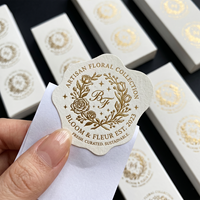Autocollants en papier texturé blanc avec logo personnalisé, gaufrage à chaud en feuille d'or, emballage de luxe, étiquette adhésive fabriquée en Chine, cadeau artisanal
