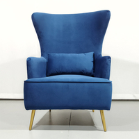 Fauteuil luxe de style moderne et contemporain, pour vip, à dossier haut, en velours vert, avec ailes