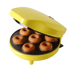 Mini waffle maker for kids breakfast cooking egg cake /desserts /pop cake make 7 donuts shapes electric waffle maker