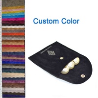 Pochette à bijoux à bouton-pression en daim noir pour bracelets, colliers et boucles d'oreilles avec logo argenté