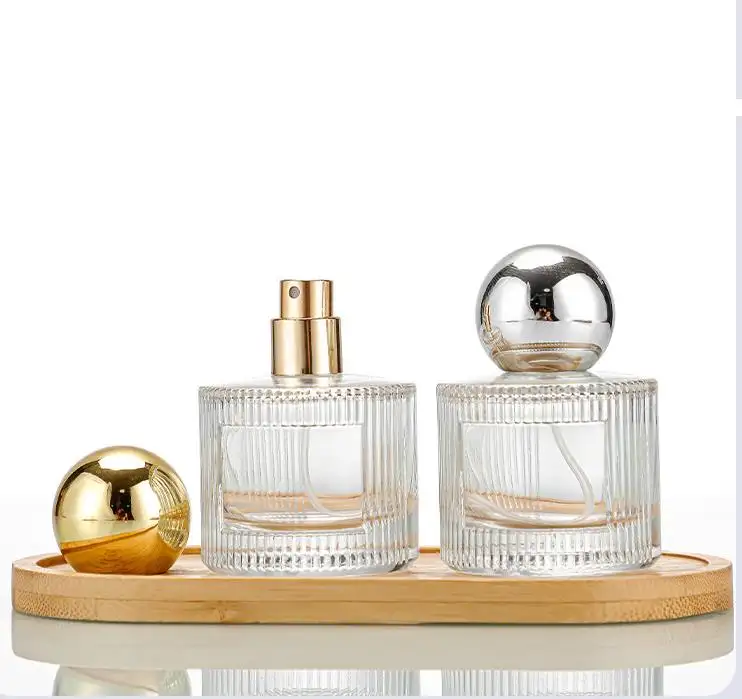 Toptan doldurulabilir 30ml 50ml temizle boş kozmetik parfüm cam pompa sprey şişe cam üreticisi ile altın vidalı kapak